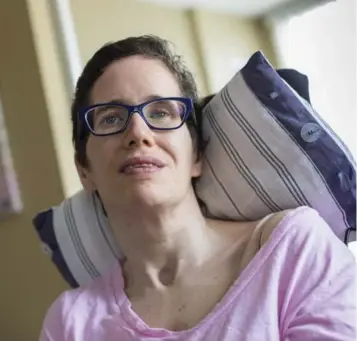  ?? BERNARD WEIL/TORONTO STAR ?? Mary Archer, 38, recently moved into supportive housing seven years after a tragic post-operation accident at St. Michael’s Hospital that left her with severe brain damage and forever altered her life and those of her loved ones.