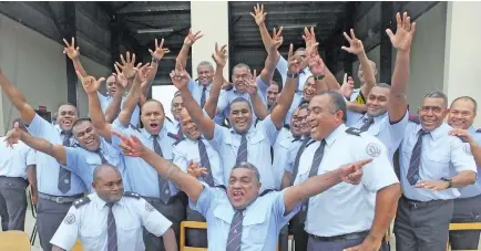  ?? Photo: National Fire Authority ?? National Fire Authority firefighte­rs and staff members celebrate after the announceme­nt at Korovou Fire Station on December 22, 2017.