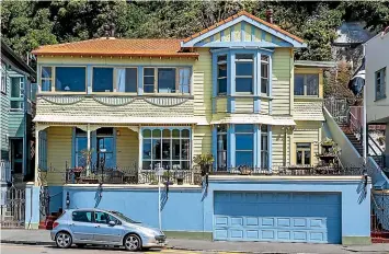  ??  ?? The blue and yellow villa at 186 Oriental Parade dates back to the early 1900s. It has come on to the market for the first time in more than two decades.