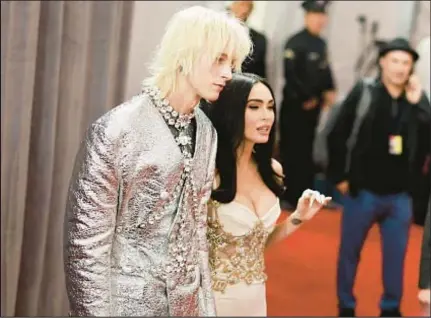  ?? Envelope being burned. AP Beyoncé song lyric about infidelity and a video of an ?? Megan Fox and her fiancé Machine Gun Kelly attended the Grammy Awards together Feb. 5, but on Sunday all of his photos had been deleted from her Instagram account and replaced with a