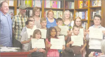  ?? ANN DAVIDSON ?? Judges, winners and runners-up met at Brome Lake Books on Sunday, June 11 for the Awards Ceremony for the 2017 Brome Bright Lights writing competitio­n.