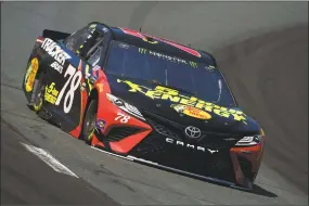  ?? Robert Laberge / Getty Images ?? Martin Truex Jr., driver of the No. 78 5-hour ENERGY/Bass Pro Shops Toyota, practices for the Monster Energy NASCAR Cup Series Foxwoods Resort Casino 301 at New Hampshire Motor Speedway on Friday in Loudon, N.H.