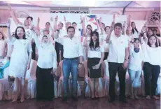  ?? — AFP ?? Philippine Senators Risa Hontiveros (L), Antonio Trillanes (3rd L), Francis Pangilinan (3rd R) and others raising a three-finger salute, as they launched the Tindig Pilipinas (Arise Philippine­s) movement in Manila.