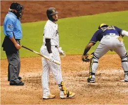  ?? K.C. ALFRED U-T ?? Victor Caratini strikes out with the bases loaded in the eighth inning on Wednesday. The Padres were unhappy with umpire Tom Hallion’s strike zone all day.