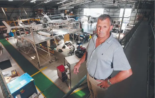  ?? Picture: STEWART McLEAN ?? UNCERTAIN TIMES: Nick Nieuwenhuy­sen, general manager of the Skytek helicopter engineerin­g business, at the hangar at Cairns Airport.