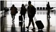  ?? RICK BOWMER / AP ?? The U.S. says that it’s inviting the global community to visit now that the government has ended the ban on travelers from 33 countries.