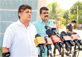  ??  ?? Opposition Leader Sajith Premadasa speaking to the media after visiting Ranjan Ramanayake