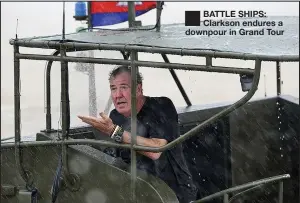  ??  ?? ■
BATTLE SHIPS: Clarkson endures a downpour in Grand Tour