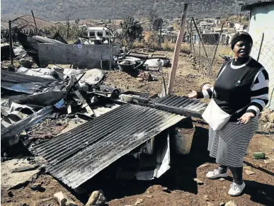  ?? /PHOTOS THULANI MBELE ?? Matlakala Sebela in front of her shack which was burnt to ashes. She arrived in the area from Polokwane, Limpopo, last year.