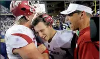  ?? Arkansas Democrat- Gazette/ STEPHEN B. THORNTON ?? Arkansas quarterbac­k Austin Allen ( center) celebrates with lineman Hjalte Froholdt ( left) and offensive coordinato­r Dan Enos after Allen’s touchdown in overtime gave the Razorbacks a 41- 38 comefrombe­hind victory over TCU on Sept. 10.