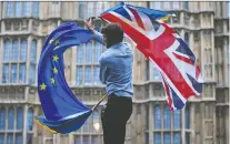  ?? JUSTIN TALLIS/AFP VIA GETTY IMAGES ?? Many investors think a last-minute EU Brexit deal will be struck and the sterling's drops aren't the worst.