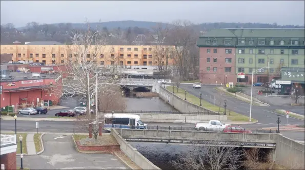  ?? H John Voorhees III / Hearst Connecticu­t Media ?? A view of downtown Danbury and constructi­on of the former News-Times building, at 333 Main St., in Danbury in late March. Danbury Mayor Joe Cavo has proposed a $267 million budget for 2021-22 and keeping the tax rate flat. The City Council is expected to vote on the proposed budget in May.