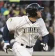  ?? SEAN RAYFORD/THE ASSOCIATED PRESS ?? Columbia Fireflies’ Tim Tebow watches his home run against the Augusta GreenJacke­ts Thursday.