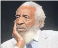  ?? FREDERICK M. BROWN, GETTY IMAGES ?? Comedian and social activist, Dick Gregory