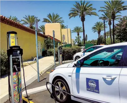  ?? SDG&E ?? A Chula Vista city vehicle uses a Power Your Drive electric vehicle charging station, which was installed by San Diego Gas & Electric.