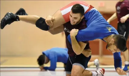  ?? BARRY GRAY, THE HAMILTON SPECTATOR ?? Ahmed Shamiya, McMaster wrestler, has his sights set on the some pretty lofty goals, including being an Olympic and world champion.