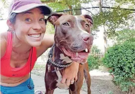  ?? [PHOTO PROVIDED BY SHAUNA WAITE] ?? Veterinari­an Shauna Waite runs with her dog, Ducky.