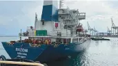  ?? TURKISH DEFENSE MINISTRY ?? The Sierra Leone-flagged dry cargo ship Razoni departs from the Black Sea port of Odesa.