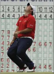  ?? DAVID J. PHILLIP — THE ASSOCIATED PRESS ?? Patrick Reed reacts after missing a birdie putt on the 18th hole during the third round of the U.S. Open golf tournament Saturday at Erin Hills in Erin, Wis.