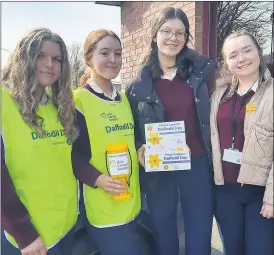  ?? (Pic: Marian Roche) ?? 5th Year Presentati­on Secondary School students collecting for Daffodil Day at SuperValu Mitchelsto­wn, (l-r): Molly Dalton, Caoimhe Connolly, Leah Conway and Roisín Sheehan.