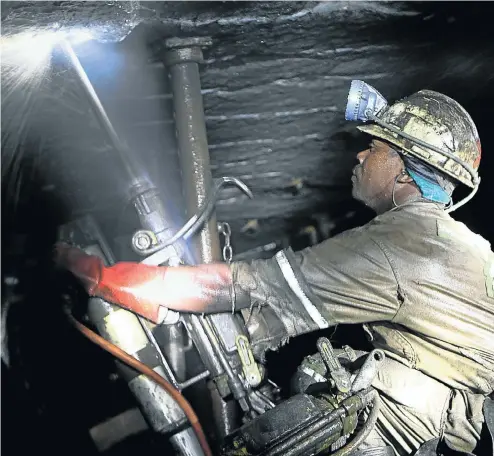  ?? Picture: Moeletsi Mabe ?? A rock-drill operator working undergroun­d at Lonmin’s platinum mine at Marikana. Two of the largest players in the global platinum industry have between them announced that they will cut more than 25,000 jobs in the coming years as they close shafts and attempt to limit oversupply of the metal.