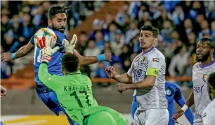  ?? AFP ?? Al Ain’s goalkeeper Khalid Eisa makes a brilliant save during the AFC champions league Group C match against Iran’s Esteghlal on Tuesday. —