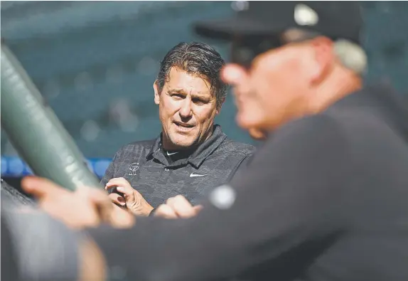  ?? Joe Amon, The Denver Post ?? Rockies head trainer Keith Dugger may not be a doctor, but he is always “on call” for players throughout the organizati­on.