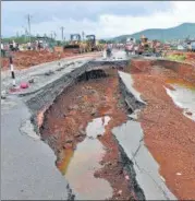  ??  ?? Rain washes away a section of highway in Mahad.