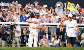  ?? Championsh­ip. Photograph: Aaron Doster/USA Today Sports ?? Michael Block hugs Rory McIlroy on the 18th green after the final round of the US PGA