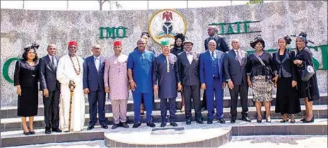  ??  ?? Imo State Governor Emeka Ihedioha (middle) with the newly-appointed Judges and well-wishers after their swearing-in ceremony in Owerri… yesterday