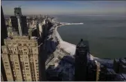  ?? Brian Cassella/Chicago Tribune/TNS ?? A view of North DuSable Lake Shore Drive and the open water on Lake Michigan on Jan. 31, from 875 N. Michigan Ave., the building formerly known as the John Hancock Center.