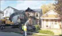  ??  ?? The home at 211 Fillmore St. in east Dayton was torn down using federal funds. The Montgomery County land bank was awarded an additional $500,000 to knock down blighted properties in four local communitie­s.