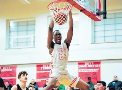  ?? /GARY MIDDENDORF / DAILY SOUTHTOWN ?? Homewood-Flossmoor’s ChristianM­eeks throws down a dunk against Oak Lawn during the Class 4A Marist Regional championsh­ip game.