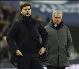  ?? Picture: EPA-EFE ?? TAKE NOTES, JOSE: Spurs boss Mauricio Pochettino communicat­es with one of his players as Jose Mourinho looks on during Spurs’ 2-0 win over Manchester United on Wednesday.