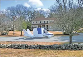  ??  ?? This flying car from Terrafugia is slated for production this year.