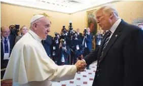  ?? THE ASSOCIATED PRESS ?? Pope Francis meets with President Donald Trump at the Vatican on Wednesday.