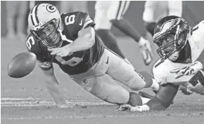  ?? ADAM WESLEY / USA TODAY NETWORK-WISCONSIN ?? Green Bay Packers quarterbac­k Joe Callahan attempts to recover his fumble in the fourth quarter against the Philadelph­ia Eagles Aug. 10 at Lambeau Field.