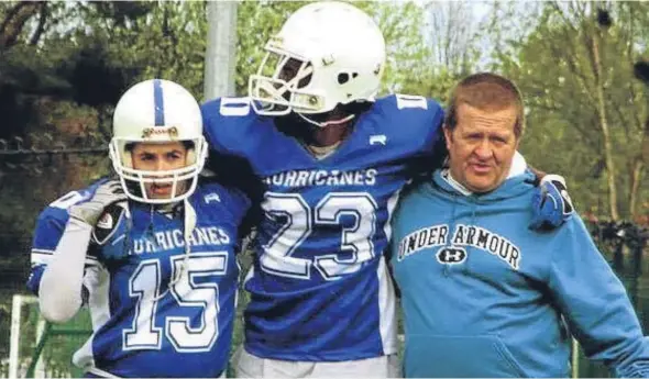  ??  ?? Kris Gibson, Mike Dotts and Charlie Campbell. Charlie is helping an injured Mike off the field during a game for the Dundee Hurricanes.