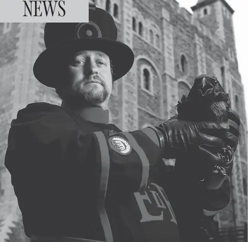  ?? HARPER COLLINS ?? Christophe­r Skaife, the Ravenmaste­r at the Tower of London, is shown with one of his charges. Skaife has written a memoir about his experience.