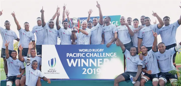  ?? Ronald Kumar ?? Swire Shipping Fijian Warriors players with Prime Minister Voreqe Bainimaram­a after winning the 2019 World Rugby Pacific Challenge at the ANZ Stadium, Suva on March 16, 2019. Photo: