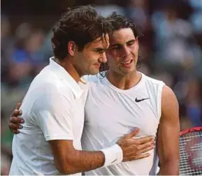  ??  ?? Rafael Nadal (right) and Roger Federer.