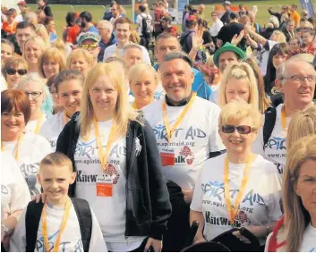  ??  ?? On the move The annual Kiltwalk event always proves hugely popular with fundraiser­s