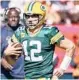  ?? KAMIL KRZACZYNSK­I/AP ?? Since a Week 1 loss, Aaron Rodgers and the Packers have won five straight.