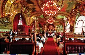  ?? ?? GOLDEN AGE: Le Train Bleu restaurant at Gare de Lyon in Paris. Below: A Nightjet sleeper train at Vienna