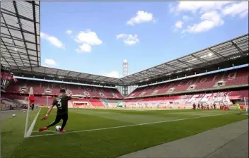  ?? AP PHOTO/LARS BARON, POOL ?? Aaron of FSV Mainz 05 takes a corner kick during the German Bundesliga soccer match between 1. FC Cologne and FSV Mainz 05 in Cologne, Germany, Sunday.