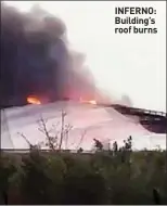  ??  ?? INFERNO: Building’s roof burns