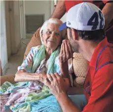  ?? NAPLES DAILY NEWS ?? Ninety-seven-year-old Vitalia Blanco thanks NASCAR driver Jimmie Johnson in Naples on Monday.