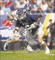  ?? Mitchell Leff / Getty Images ?? Yale’s T.D. Ierlan (6) was taken with the top overall pick of the MLL Draft on Monday night.