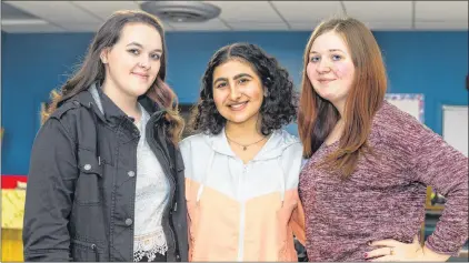  ?? CARL ROSE/SPECIAL TO THE SOUTHERN GAZETTE ?? Rand Al-shajairi with two of her John Burke classmates, Mackenzie Hillier, left, and Alisha Billard.