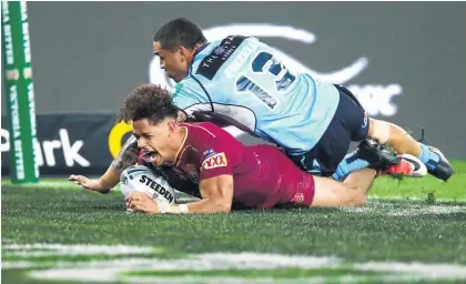  ?? Picture / Getty Images ?? Dane Gagai finishes off a brilliant set from Queensland in State of Orgin II in Sydney last night.